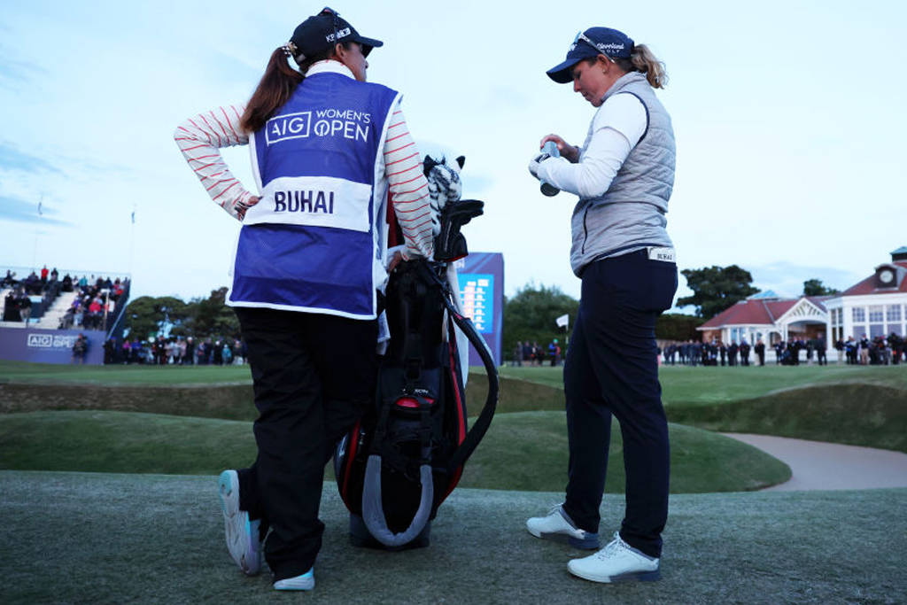 Ashleigh Buhai (right) in conversation with her caddie Tanya Paterson during the AIG Women